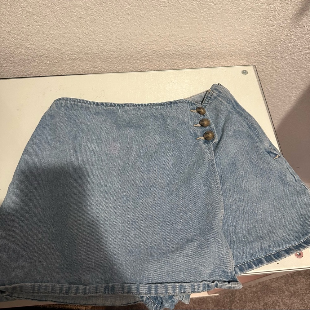 A jean short/skirt, size medium, from forever 21.